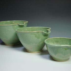 Set of three green ceramic nestling mixing bowls