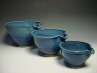 Set of three blue ceramic nestling mixing bowls