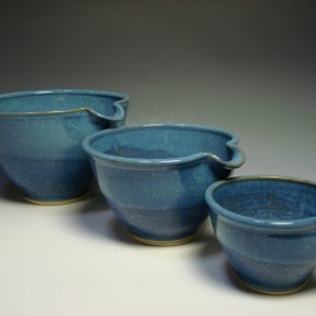 Set of three blue ceramic nestling mixing bowls