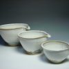 Set of three white ceramic nestling mixing bowls