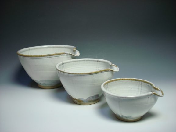 Set of three white ceramic nestling mixing bowls
