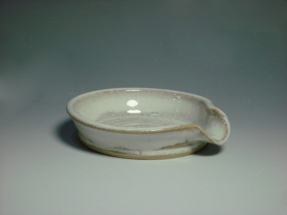 white ceramic spoon rest